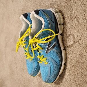 New Balance 780 sneakers, women's size 7, blue and yellow